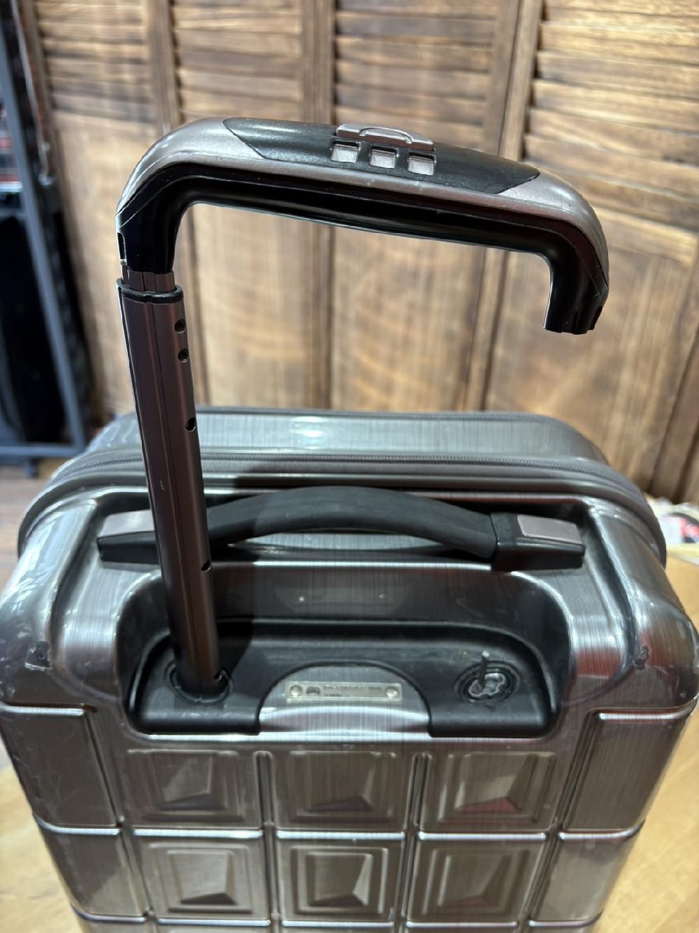 アジアラゲージスーツケース収縮ハンドル交換