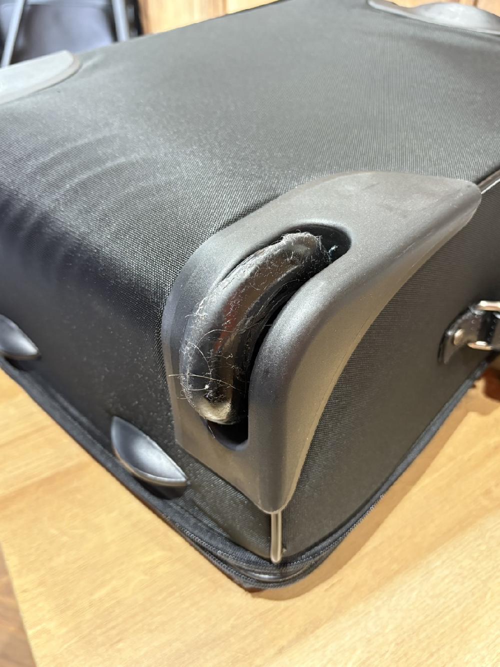 COACHスーツケース二輪キャスター交換