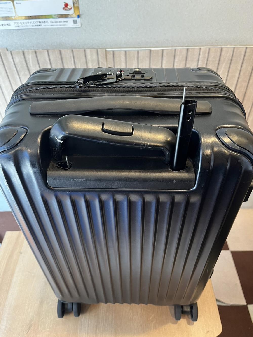 スーツケース収縮ハンドル交換