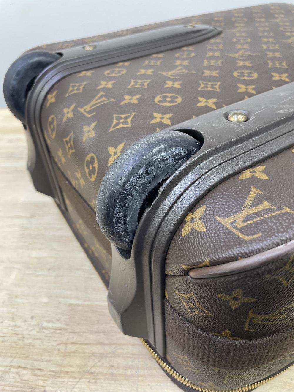 ルイヴィトンスーツケース二輪キャスター交換